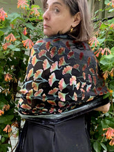 Load image into Gallery viewer, women from behind wearing orange flowers  burnout velvet scarf 1